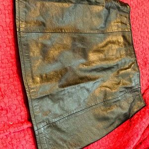 Mini black leather skirt